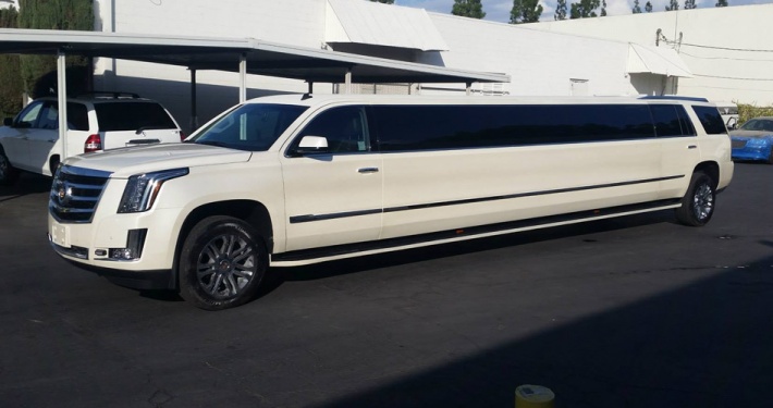 Cadillac Stretch SUV Limousine White Jet Doors