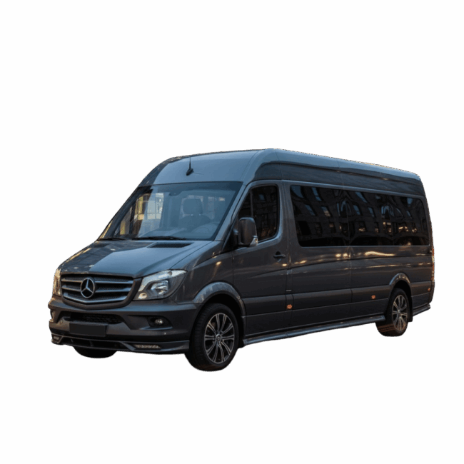 Exterior view of a professional 14-passenger Mercedes-Benz Sprinter shuttle van in metallic grey, featuring a high-roof extended body and tinted windows, captured at twilight in an urban business district for luxury group transportation services.